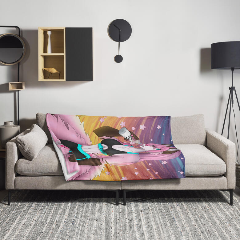 Photo showing 50''x60'' blanket on a couch